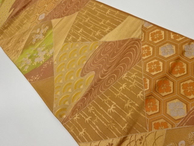 リサイクル　切り嵌め風古典柄に草花・竹・流水模様織出し袋帯